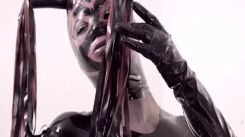 Fetish sheboy In Latex Suit And Mask fucks