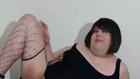 Linda In Her taut One Piece Tugging Her Little Clitty