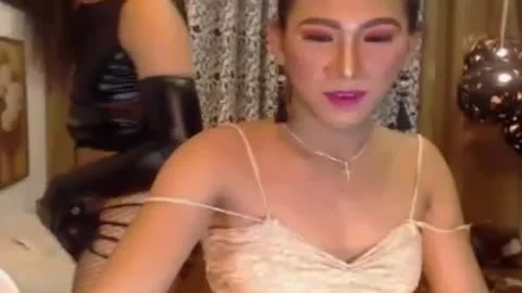 Two nasty shemales suck And jack off On web camera