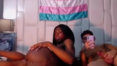 Skinny darksome Colombian ladyboy playgirl acquires oral-sex By Her White chap On webcam