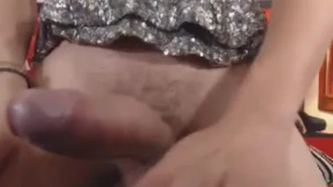 pretty ladyboy Stroking Her massive penis