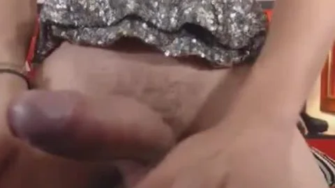pretty ladyboy Stroking Her massive penis
