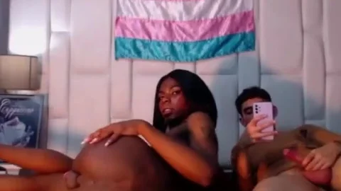 Skinny darksome Colombian ladyboy playgirl acquires oral-sex By Her White chap On webcam