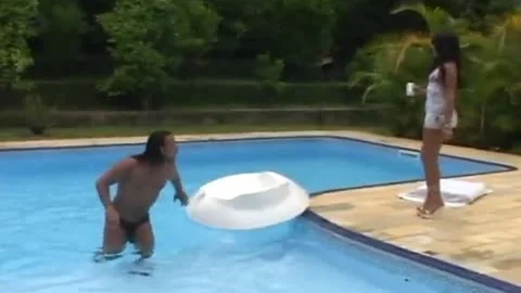 man bonks latina TS Poolside