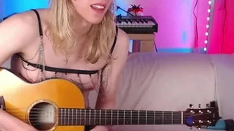 blond Trans sweetie Plays The Guitar On webcam