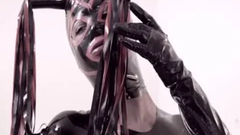 Fetish sheboy In Latex Suit And Mask fucks