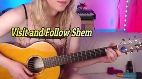 blond Trans sweetie Plays The Guitar On webcam