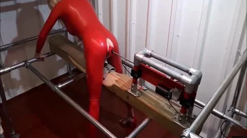 RachelSexyMaid 34 Dungeon Fuckmachine In Red Latex Catsuit