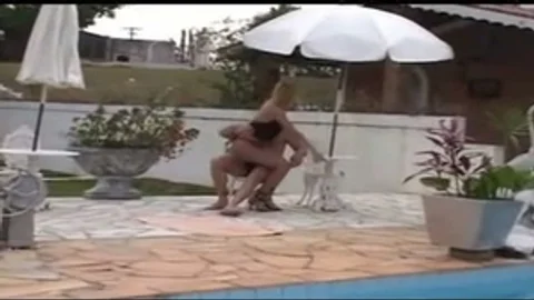 blonde TS receives Laid Poolside